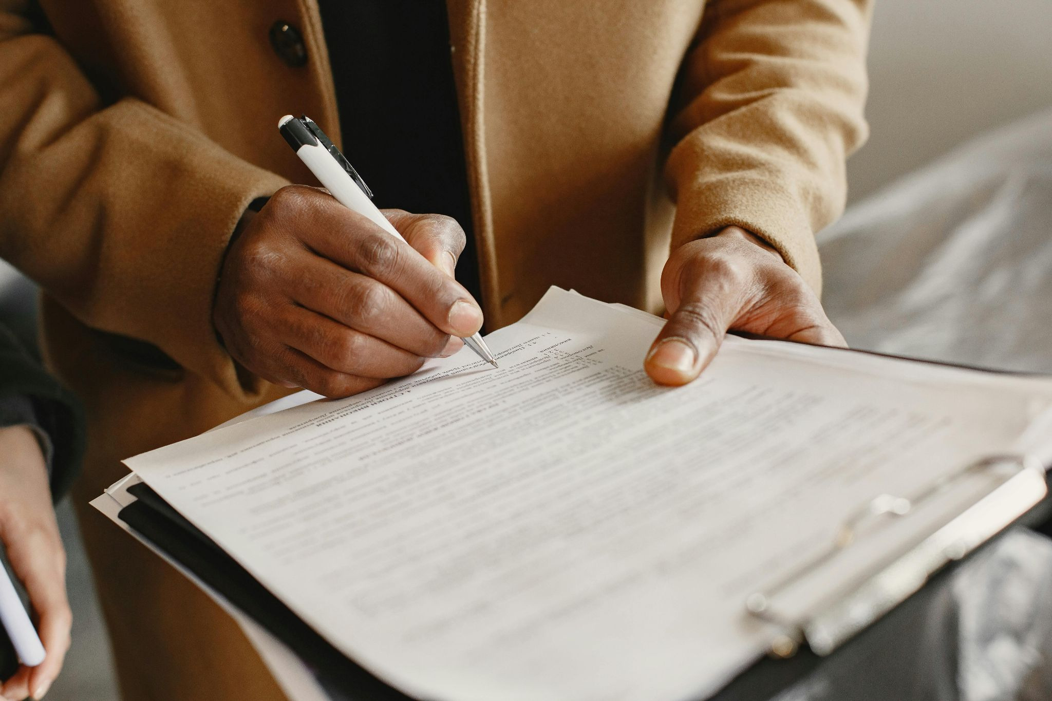 Person Reviewing a Lease Agreement